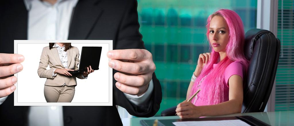 Woman planning outfits on a calendar with colorful post-its