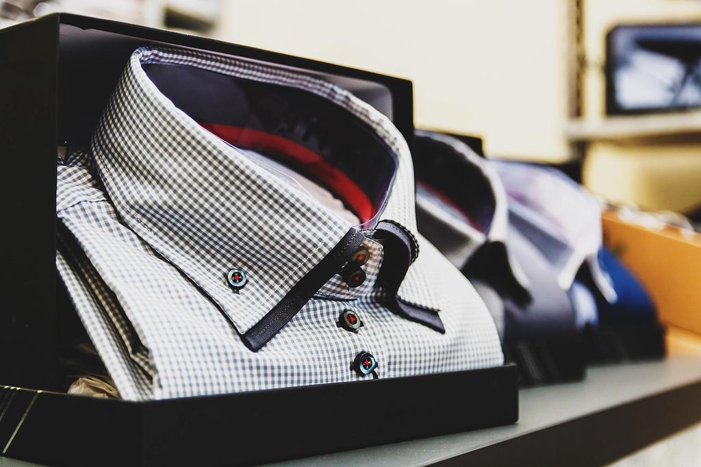 Person folding clothes neatly into drawers