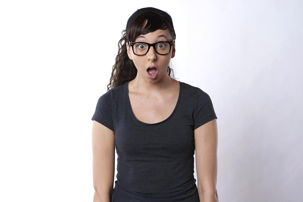 Flat lay of stylish clothes and accessories with planning notes